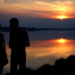 Silhouette of a couple at sunset — dreaming about your ex