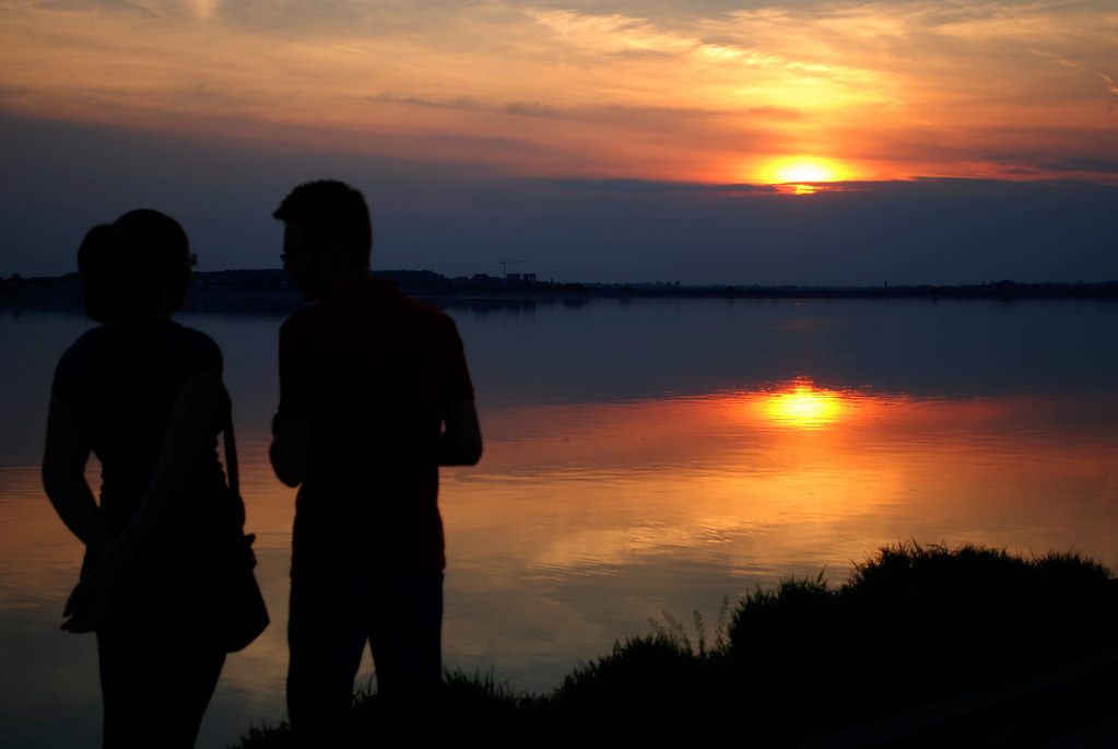 Silhouette of a couple at sunset — dreaming about your ex